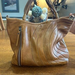 Latico Leather Joplin. very clean. Beautiful leather, rich and slouchy.